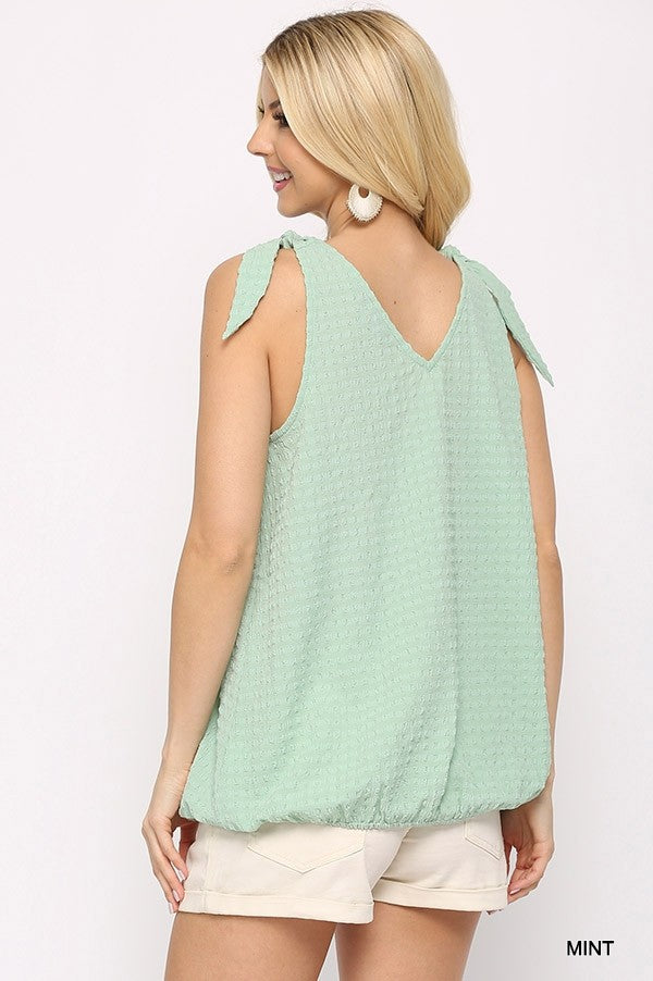 Solid Textured And Sleeveless Surplice Top With Shoulder Tie